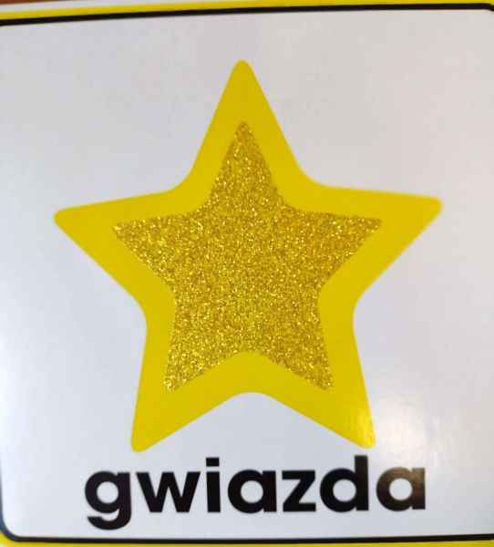 zdjęcie strony książki z grafiką gwiazdy  podpisem